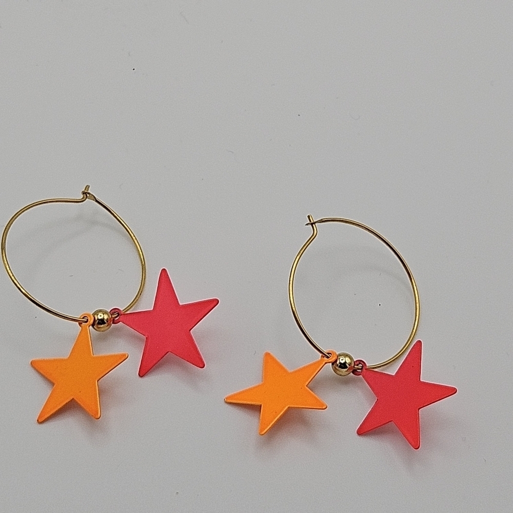 gold tone hoop earrings with neon pink and orange stars - Picture 3 of 4